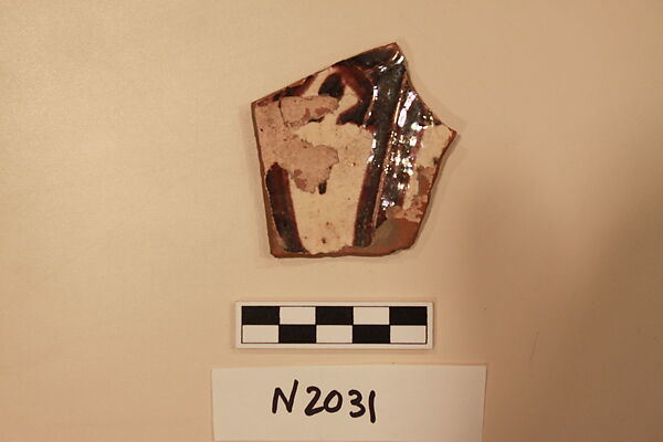 Ceramic Fragment, Earthenware; white slipped, slip-painted under a colorless glaze 