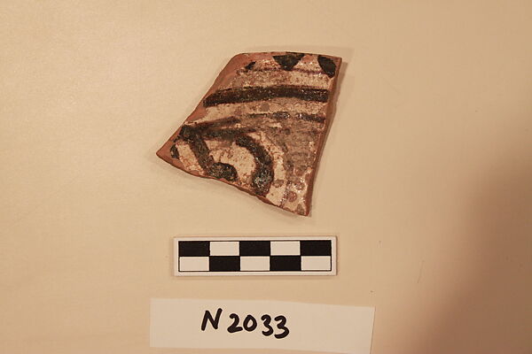 Ceramic Fragment, Earthenware; white slipped, slip-painted  under a colorless glaze 