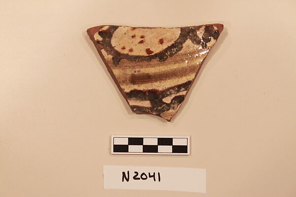 Ceramic Fragment, Earthenware; white slipped, slip-painted under a colorless glaze 