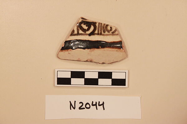 Ceramic Fragment, Earthenware; white slipped, slip-painted under a yellow glaze