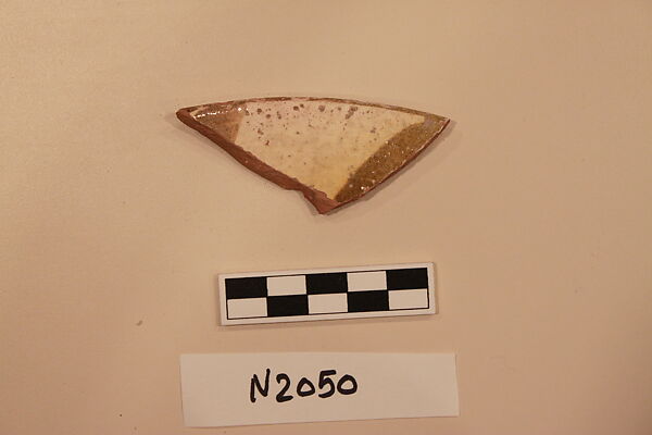 Ceramic Fragment, Earthenware; white slipped, slip-painted under a colorless glaze 