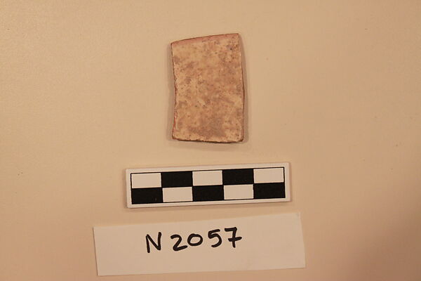Ceramic Fragment, Earthenware; white slipped, slip-painted in dark brown under a yellow glaze