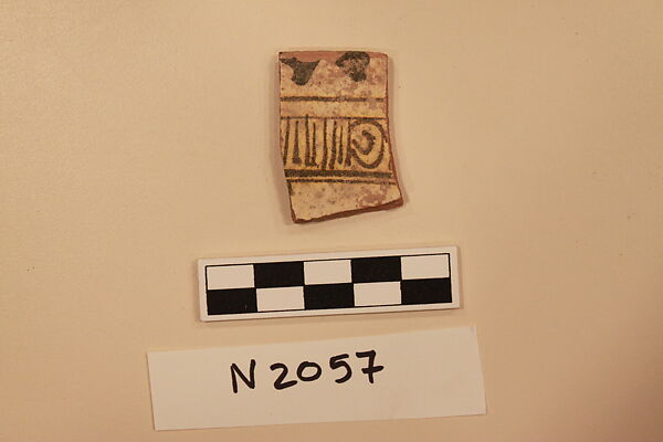 Ceramic Fragment, Earthenware; white slipped, slip-painted in dark brown under a yellow glaze 