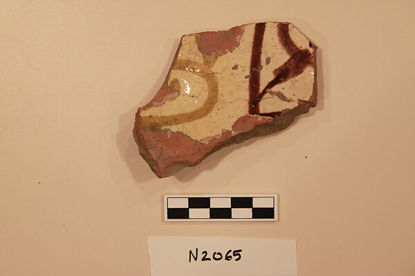 Ceramic Fragment, Earthenware; white slipped, slip-painted under a colorless glaze 