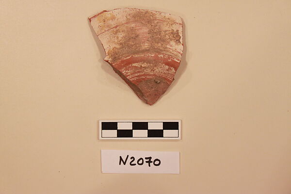 Ceramic Fragment, Earthenware; white slipped, slip-painted under a yellow glaze