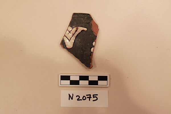 Ceramic Fragment, Earthenware; dark brown slipped, slip-painted in  white under a colorless glaze 