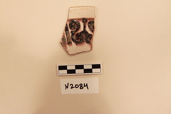 Ceramic Fragment, Earthenware; white slipped, slip-painted in dark brown under a colorless glaze 