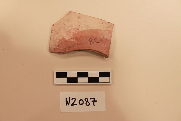 Ceramic Fragment, Earthenware; white slipped, slip-painted under a colorless glaze with a  light yellowish tintage