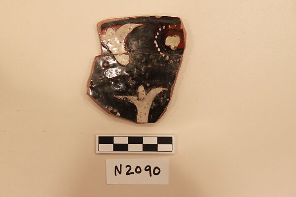 Ceramic Fragment, Earthenware; dark brown slipped, slip-painted in white under a colorless glaze 