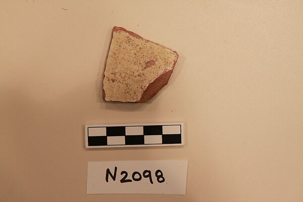 Ceramic Fragment, Earthenware; white slipped,incised and splashed under a colorless glaze
