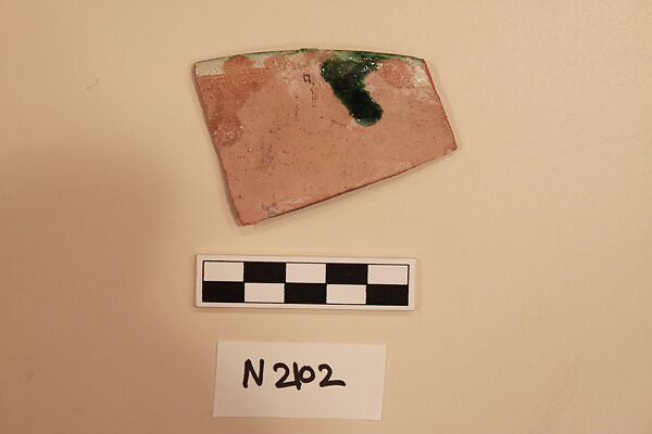 Ceramic Fragment, Earthenware; white slipped, splashed with polychrome glaze 