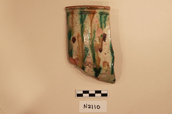 Ceramic Fragment, Earthenware; white slipped,  splashed with polychrome glaze 