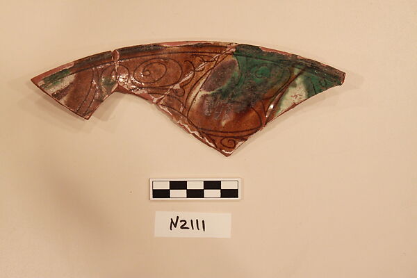 Ceramic Fragment, Earthenware; white slipped, incised and splashed with polychrome glaze 