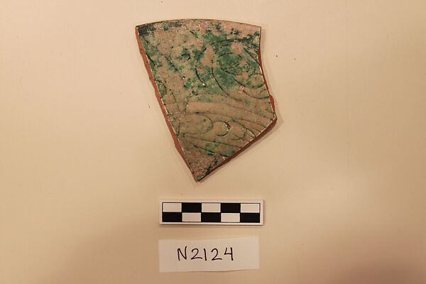 Ceramic Fragment, Earthenware; white slipped, incised with a green glaze 