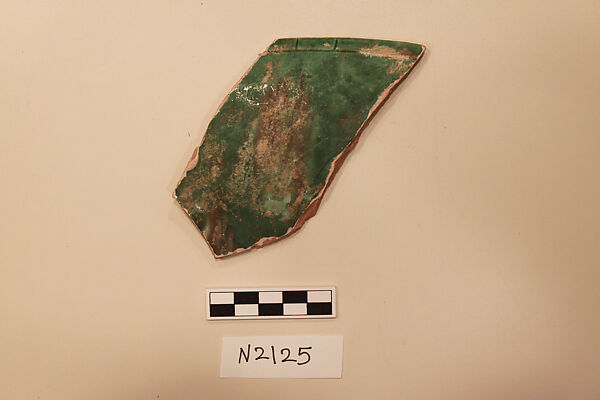 Ceramic Fragment, Earthenware; white slipped, with a green glaze