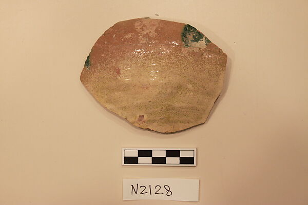 Ceramic Fragment, Earthenware; white slipped, with a green glaze. 