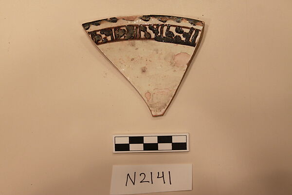 Ceramic Fragment, Earthenware; white slipped, slip-painted under a colorless glaze 