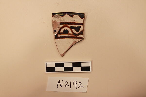 Ceramic Fragment, Earthenware; white slipped, slip-painted under colorless glaze. 