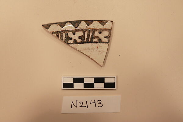 Ceramic Fragment, Earthenware; white slipped, slip-painted under a colorless glaze 