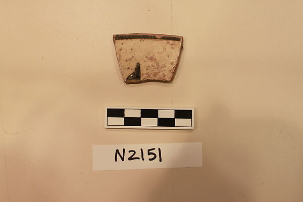 Ceramic Fragment, Earthenware; white slipped, slip painted under a colorless glaze. 