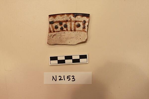 Ceramic Fragment, Earthenware; white slipped, slip painted under a colorless glaze 