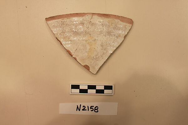 Ceramic Fragment, Earthenware; white slipped, slip painted under a colorless glaze