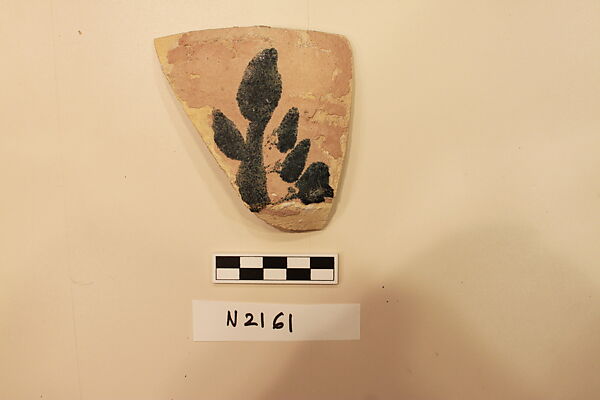 Ceramic Fragment, Earthenware; Slipped in pinkish color and glaze painted 