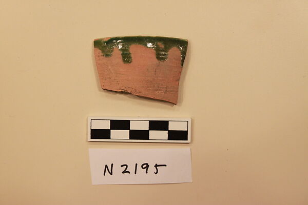 Ceramic Fragment, Earthenware; white slipped, slip-painted under a green glaze