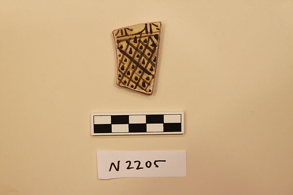Ceramic Fragment, Earthenware; slipped, slip-painted under a yellow glaze 