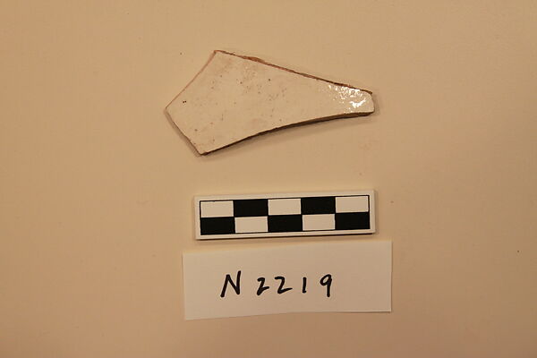 Ceramic Fragment, Earthenware; white slipped, slip painted under a colorless glaze