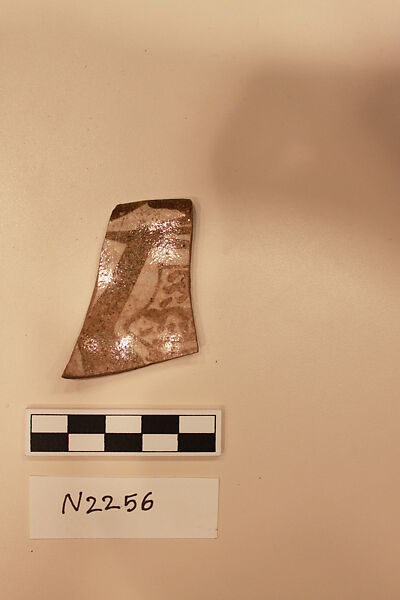 Ceramic Fragment, Earthenware; white slip and slip-painted under transparent glaze 