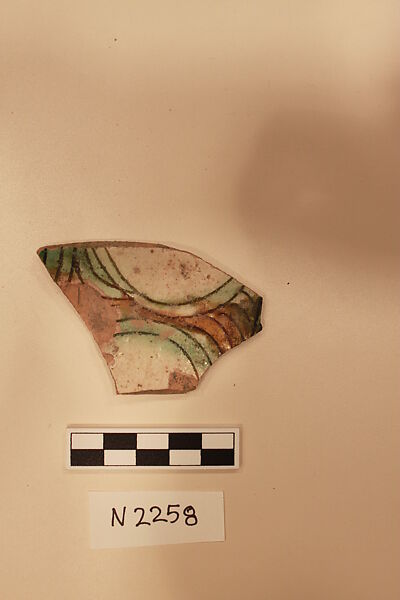 Ceramic Fragment, Earthenware; white slipped, splashed and incised under a colorless glaze. 