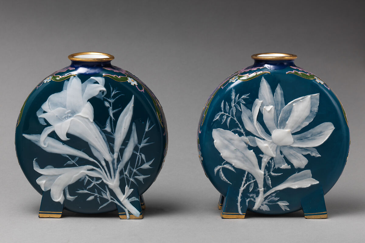 Moon flask with lily or floral motif (one of a pair), Minton(s) (British, Stoke-on-Trent, 1793–present), Bone china decorated with pâte-sur-pâte, enamel, and gilding, British, Stoke-on-Trent, Staffordshire