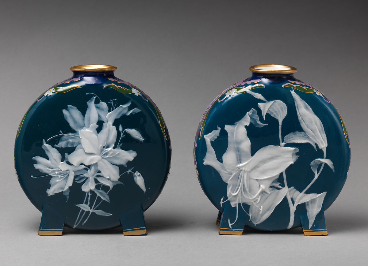 Moon flask with lily or floral motif (one of a pair), Minton(s) (British, Stoke-on-Trent, 1793–present), Bone china decorated with pâte-sur-pâte, enamel, and gilding, British, Stoke-on-Trent, Staffordshire