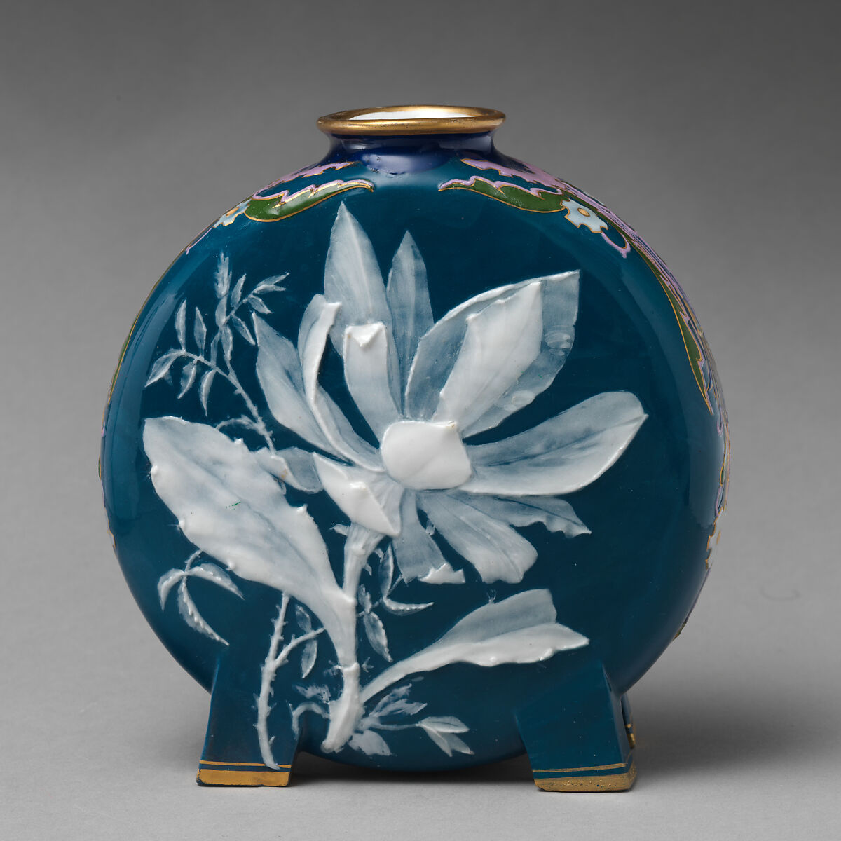 Moon flask with lily or floral motif (one of a pair), Minton(s) (British, Stoke-on-Trent, 1793–present), Bone china decorated with pâte-sur-pâte, enamel, and gilding, British, Stoke-on-Trent, Staffordshire 