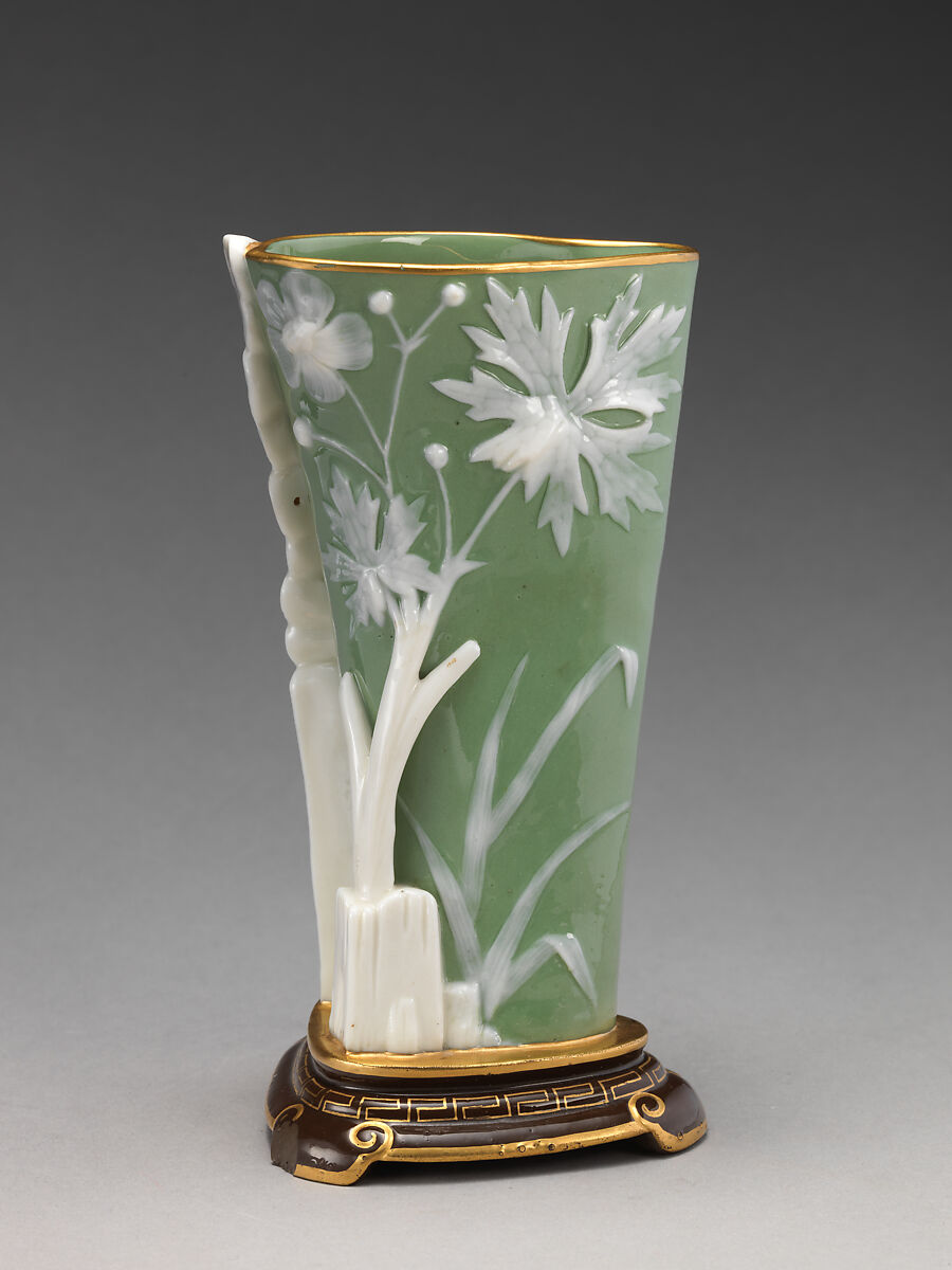 Triangular shaped vase, Minton(s) (British, Stoke-on-Trent, 1793–present), Porcelain, decorated with pâte-sur-pâte technique, British, Stoke-on-Trent, Staffordshire 