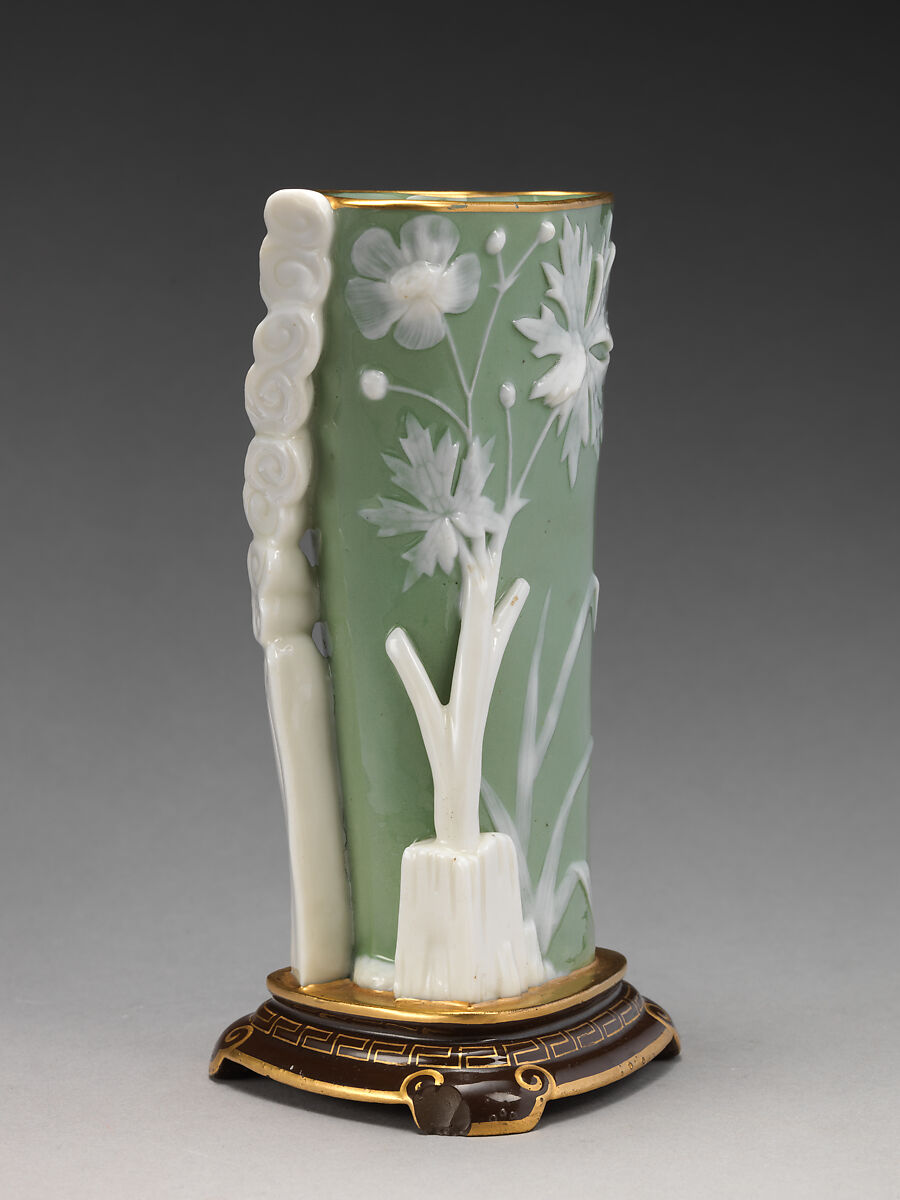 Triangular shaped vase, Minton(s) (British, Stoke-on-Trent, 1793–present), Porcelain, decorated with pâte-sur-pâte technique, British, Stoke-on-Trent, Staffordshire
