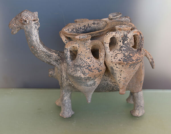 Rhyton in the form of a camel with four amphorae, Terracotta 