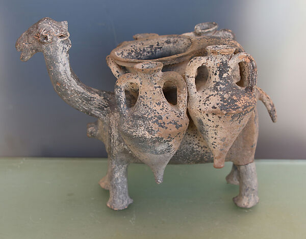 Rhyton in the form of a camel with four amphorae, Terracotta 