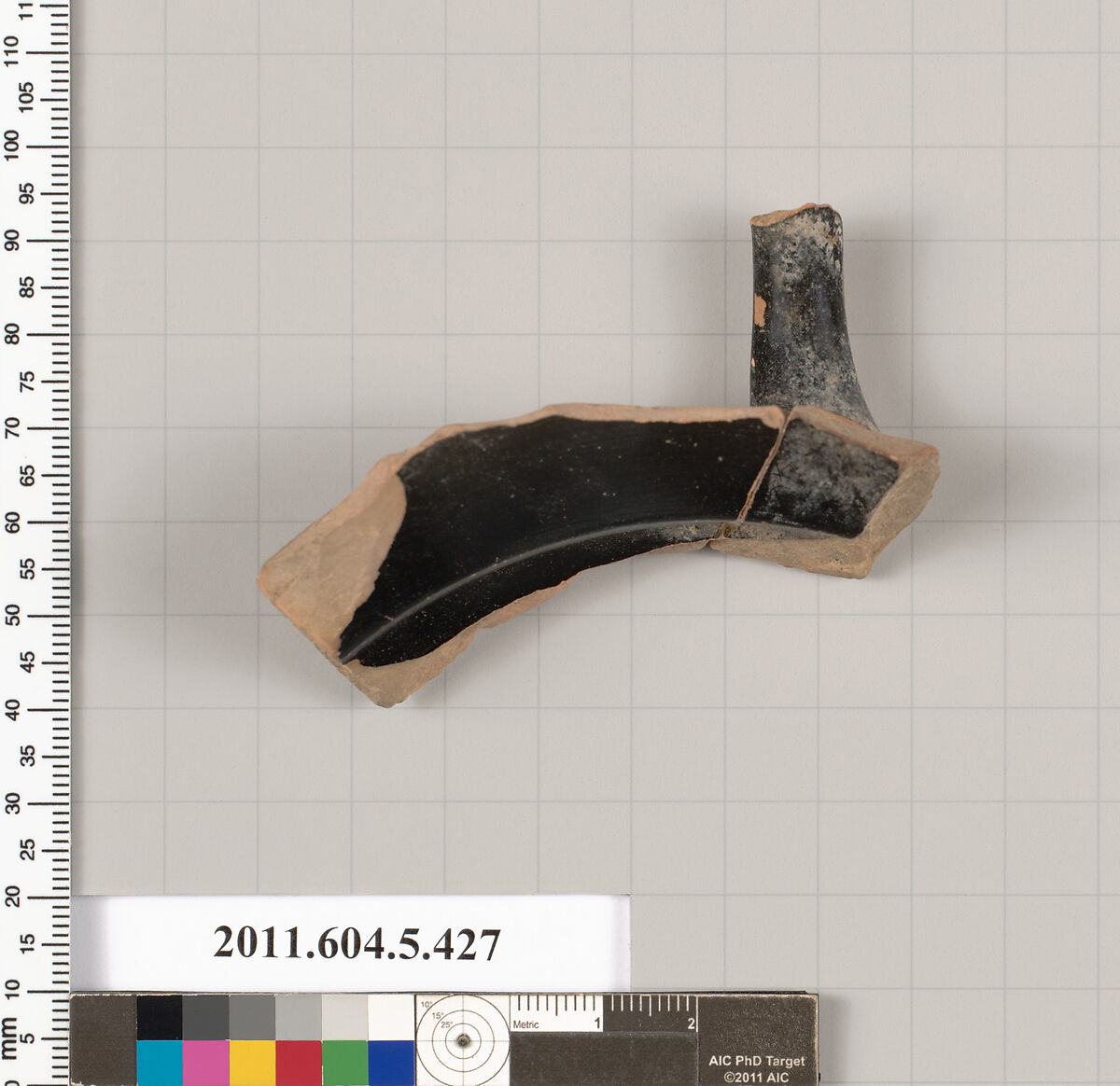 Terracotta fragment of a kylix (drinking cup), Terracotta, Greek, Attic