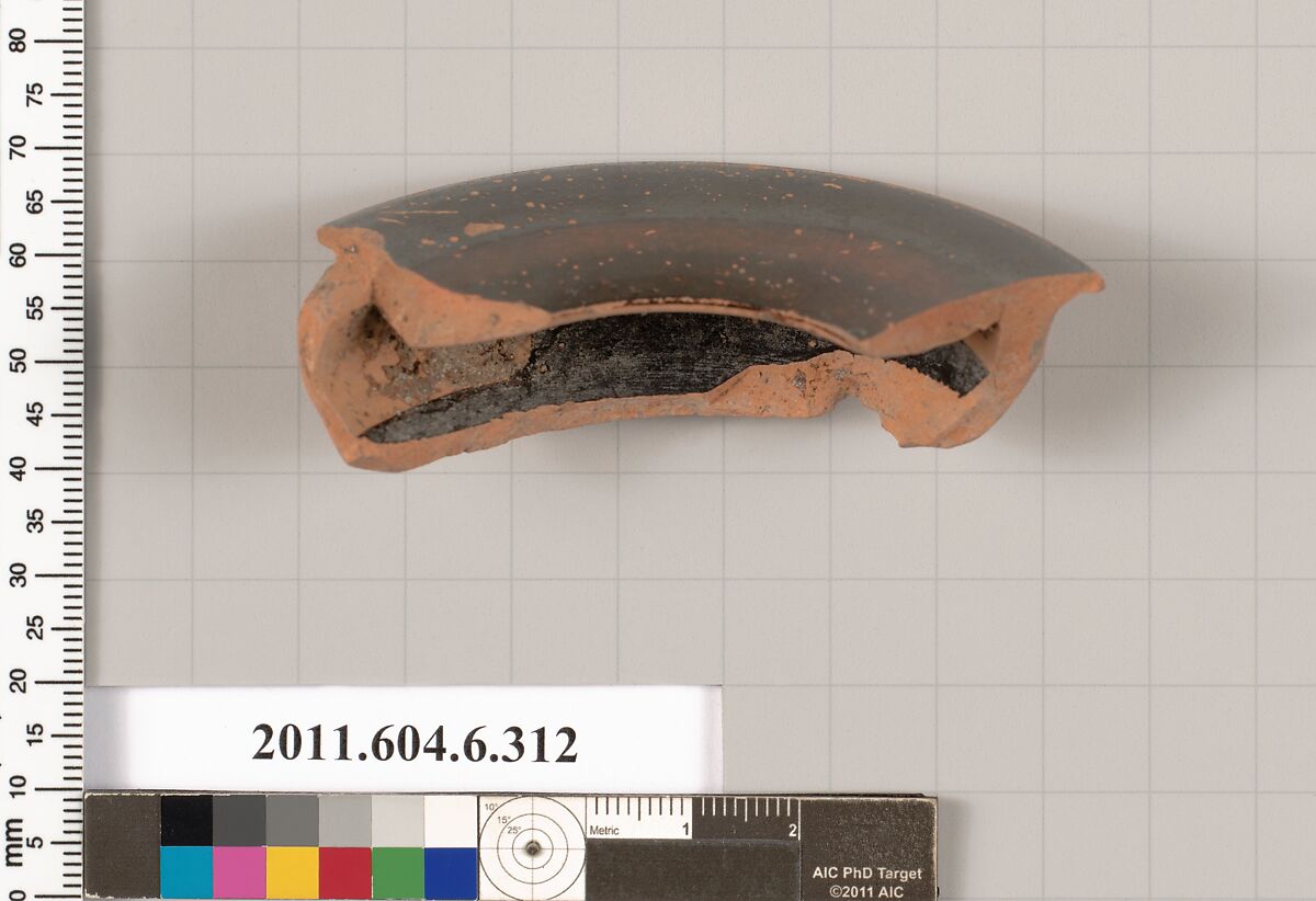 Terracotta fragment of a lamp, Terracotta, Greek, Attic