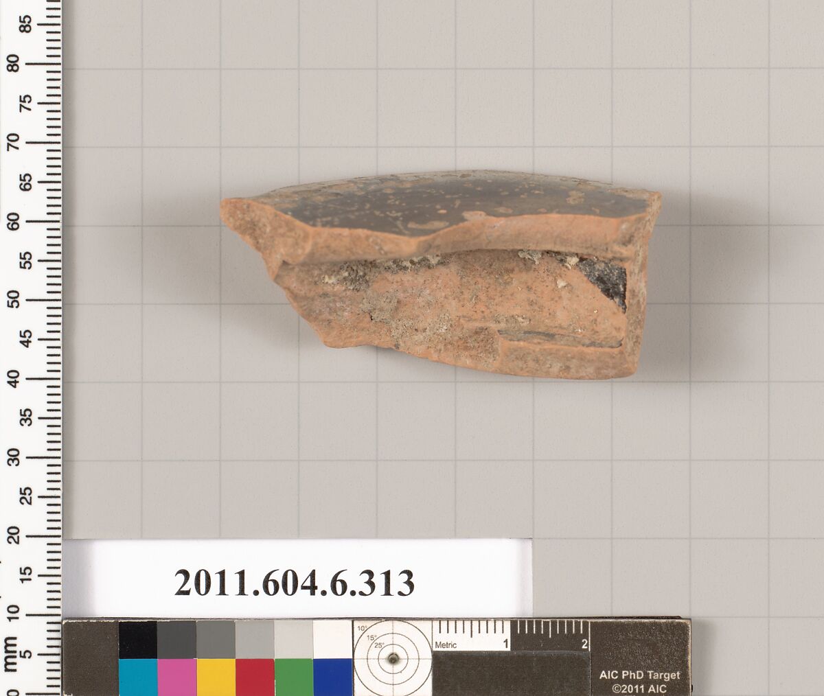 Terracotta fragment of a lamp, Terracotta, Greek, Attic