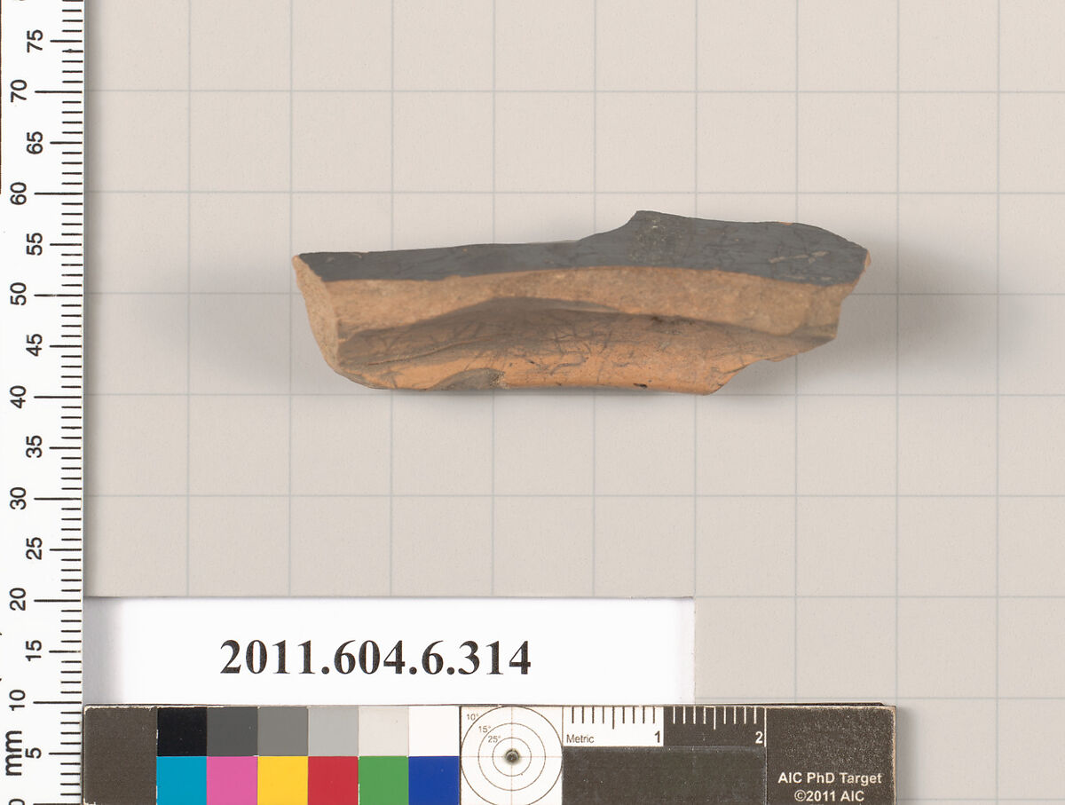 Terracotta fragment of a lamp, Terracotta, Greek, Attic