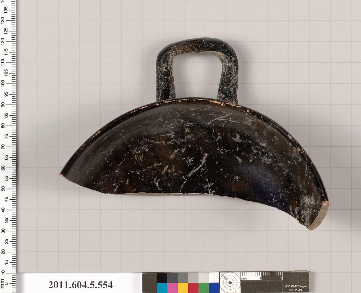 Terracotta fragment of a kylix (drinking cup) or a cup-skyphos (drinking cup?, Terracotta, Greek, Attic