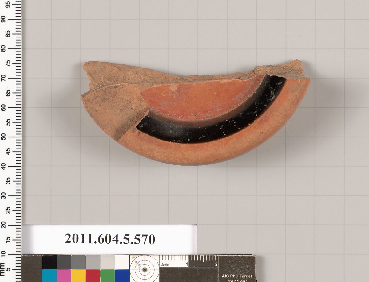 Terracotta fragment of a stemless kylix (drinking cup), Terracotta, Greek, Attic