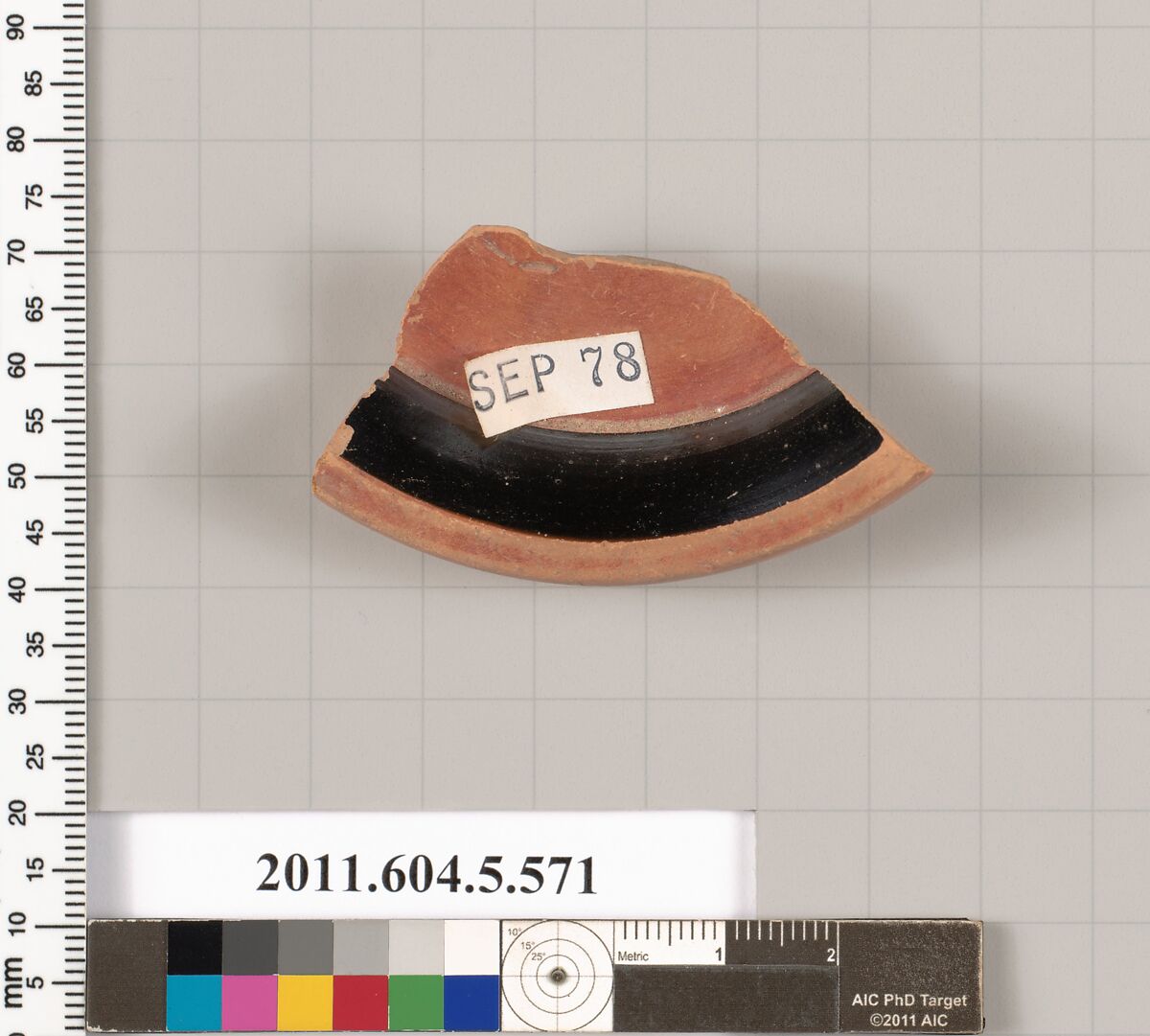 Terracotta fragment of a stemless kylix (drinking cup), Terracotta, Greek, Attic