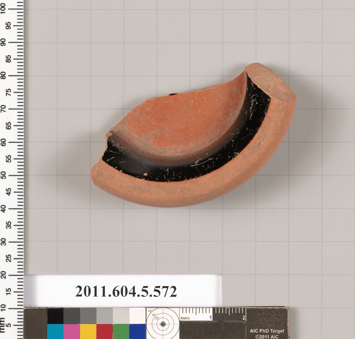 Terracotta fragment of a stemless kylix (drinking cup), Terracotta, Greek, Attic