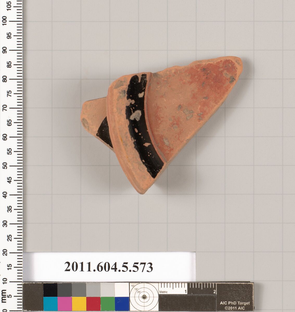 Terracotta fragment of a stemless kylix (drinking cup), Terracotta, Greek, Attic