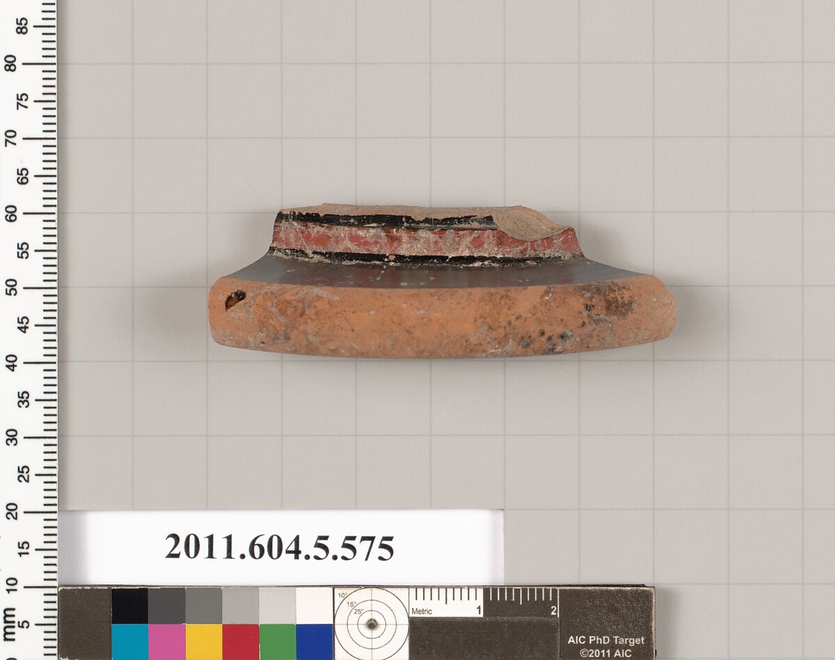 Terracotta fragment of a stemless kylix (drinking cup), Terracotta, Greek, Attic