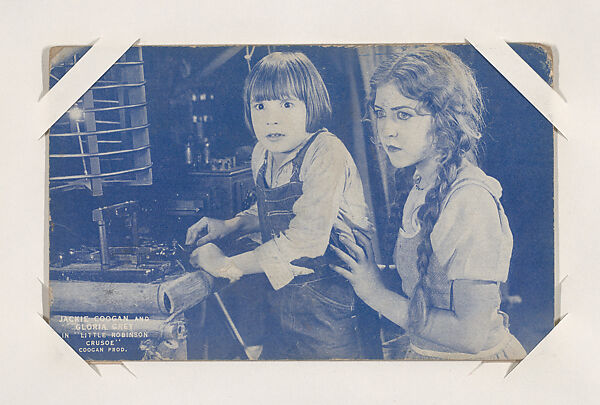 Jackie Coogan and Gloria Grey in "Little Robinson Crusoe" from Scenes from Movies Exhibit Cards series (W404), Commercial color photolithograph 